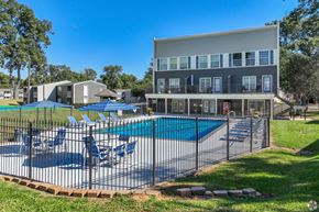 Shreveport apartment for rent - View of the entire pool area behind the leasing office at Maplewood apartments in Shreveport, LA.