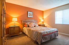 Sandy Springs apartment for rent - a bedroom with a bed and two night stands at Dunwoody Pointe in Sandy Springs, GA
