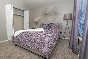 Bossier City apartment for rent - Ambassador bedroom in model home with closet at The Oasis apartments in Bossier City, LA