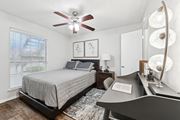Denton apartment for rent - Model unit bedroom at Oaks of Denton in Denton, TX