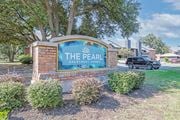 Shreveport apartment for rent - Property signage at the entrance for The Pearl apartments in Shreveport, LA