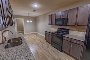 Pensacola apartment for rent - Kitchen Area at Parkside Grand Apartments in Pensacola, FL