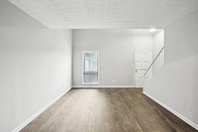 Smyrna apartment for rent - Open living room and dining room at Pine Village North in Smyrna, GA