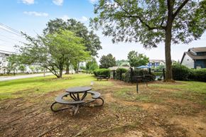 Smyrna apartment for rent - Convenient and social BBQ area at Pine Village North in Smyrna, GA