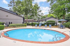 Smyrna apartment for rent - Inviting and refreshing pool area at Pine Village North in Smyrna, GA