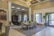 Titusville apartment for rent - a dining room with a table and chairs in front of a window