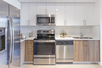 Chef-inspired kitchens feature stainless steel appliances
