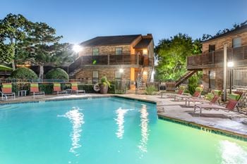 Sparkling swimming pool with tanning deck