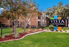 San Antonio apartment for rent - a view of the villa crossing apartment building with a sign that says visit crossing