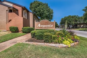 Euless apartment for rent - A sign that says Augusta in front of a building.
