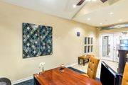 Austin apartment for rent - a conference room with a table and chairs and a fireplace