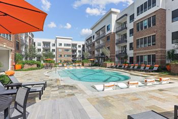 Resort-style pool with expansive tanning ledge