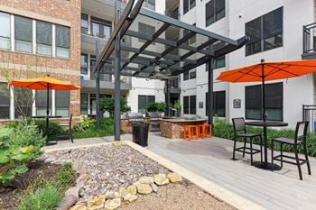 Outdoor dining area with gourmet grilling station