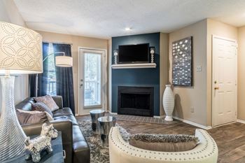 The players club apartments model unit living room