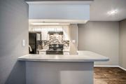 Nashville apartment for rent - Unit Kitchen with Bar Counter at The Players Club Apartments in Nashville, TN