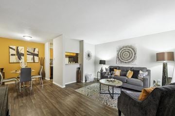 Houston apartment for rent - a living room with a couch and a table