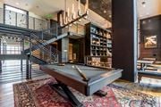 Dallas apartment for rent - Billiards table sitting inside of a decorative game room at The Case Building in Dallas, TX