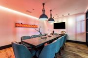 Dallas apartment for rent - Coworking space with large table at the case building apartments