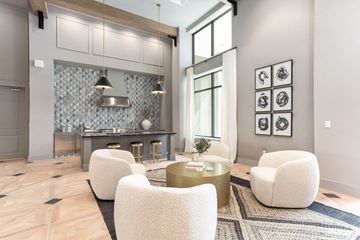 Tempe apartment for rent - a living room with white chairs and a table