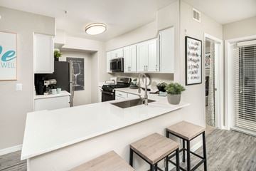 Glendale apartment for rent - a kitchen with a white counter top and a sink