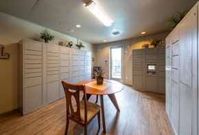 Phoenix apartment for rent - a dining room with a table and two wooden chairs