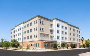 Phoenix apartment for rent - A large white building with a green roof and a number 1510 on it.