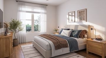 Edmond townhouse for rent - A bedroom with a large bed and a window with curtains.