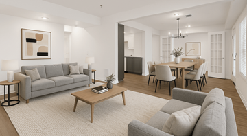 Oklahoma City apartment for rent - A modern living room with a grey sofa, a wooden coffee table, and a dining table set up with chairs.