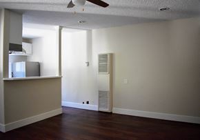 Los Angeles apartment for rent - an empty living room with a heater on the wall
