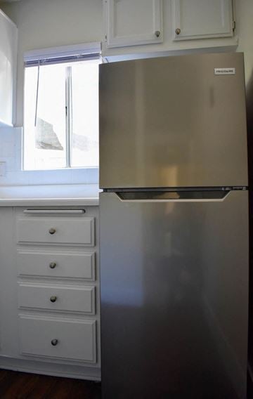Los Angeles apartment for rent - a kitchen with a stainless steel refrigerator and white drawers