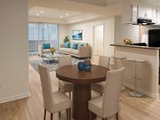 Sherman Oaks apartment for rent - A modern dining room with a round table and chairs.