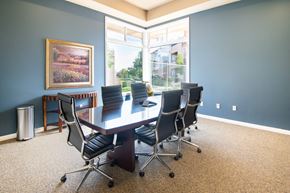Temecula apartment for rent - A conference room with a large table and chairs.