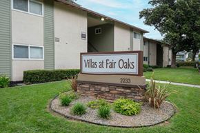 Sacramento apartment for rent - A sign for Villas at Fair Oaks in front of apartment buildings.