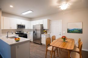 Murrieta apartment for rent - A kitchen with a table and chairs.