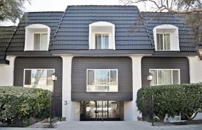 La Crescenta apartment for rent - A modern house with a black roof and white trim.