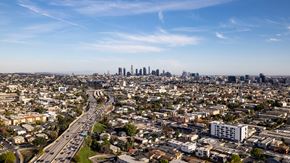 Los Angeles apartment for rent - A cityscape with a highway running through it.