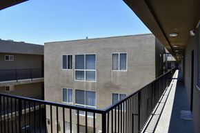 Reseda apartment for rent - the view of a building from a balcony