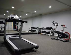 Sherman Oaks apartment for rent - View of community fitness center with treadmill, stationary bike, and free weights