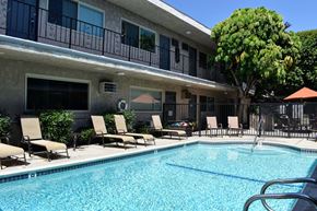 Sherman Oaks apartment for rent - Community pool with lounge chairs and seating