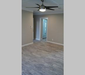 Redondo Beach apartment for rent - Living area with wood look flooring and ceiling fan