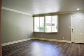 Santa Barbara apartment for rent - A room with a white door and a window with blinds.
