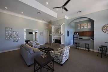 Bossier City apartment for rent - a living room with a couch and a table