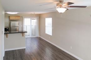 Tracy apartment for rent - view from living room towards kitchen and patio door