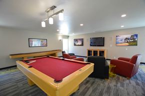 Chico apartment for rent - a game room with a pool table and chairs