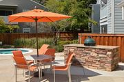 Citrus Heights apartment for rent - View of pool spa and grill area with orange umbrellas and seating area