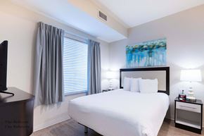 Richardson apartment for rent - a bedroom with a large white bed and a window at Parks Residential - Richardson, Texas, 75082