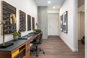 Phoenix apartment for rent - the home office has a long desk and a chalkboard wall