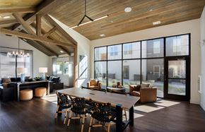 Prescott Valley apartment for rent - A modern dining room with a wooden table and chairs at The Crossings  at Windsong, Prescott Valley, 86314