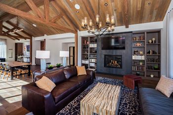 A living room with a fireplace and a couch
