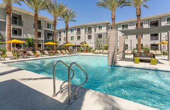 Stunning pool & spa with poolside cabanas & seating areas with firepits